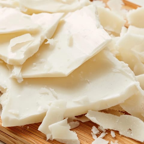 Cool, crisp parmesan shards atop delicate The Arctic Tundra white chocolate dessert.