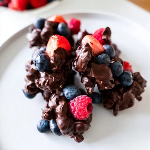 Delicious chocolate yogurt clusters, with glossy dark chocolate, ready to be enjoyed as a snack.