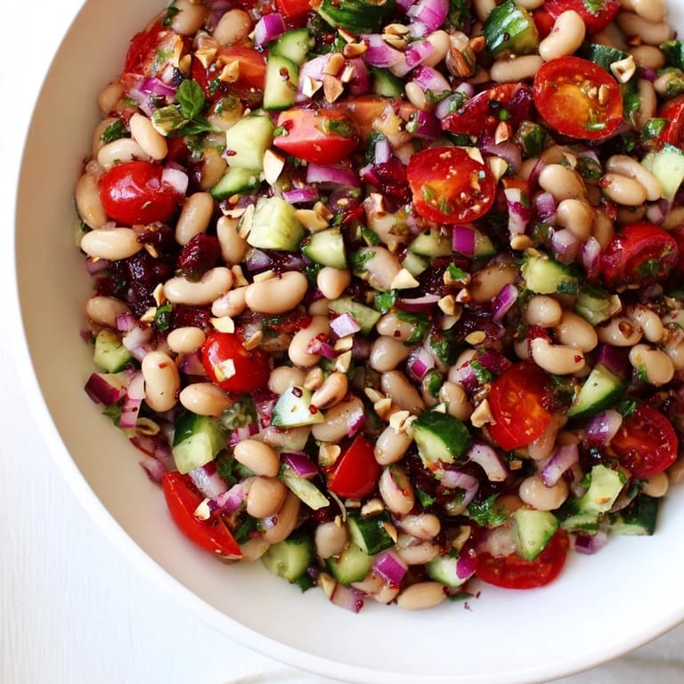 Freshly tossed Dense Bean Salad with Sleepy Girl flavors, ready for a healthy meal.